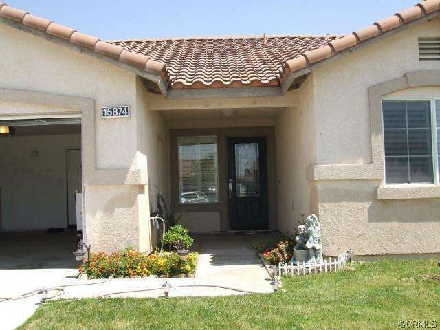 Property Photo:  15874 Mariposa Dr  CA 92336 