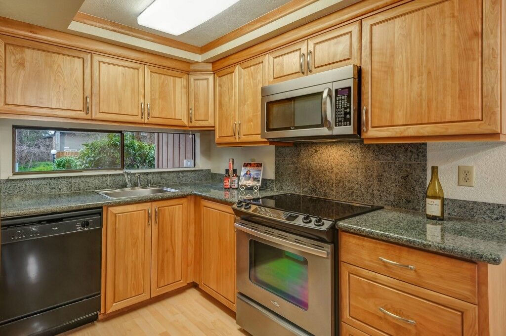 Property Photo:  4115  145th Avenue NE F1  WA 98007 