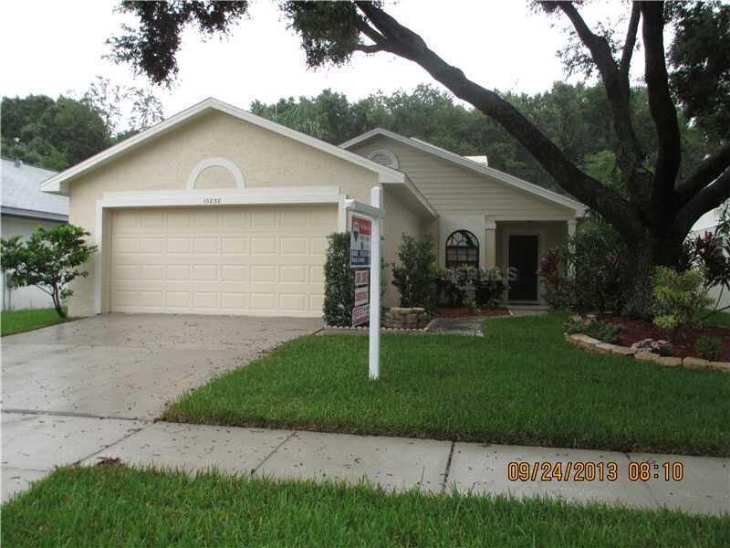 Property Photo: 10838 Peppersong Drive FL 33578