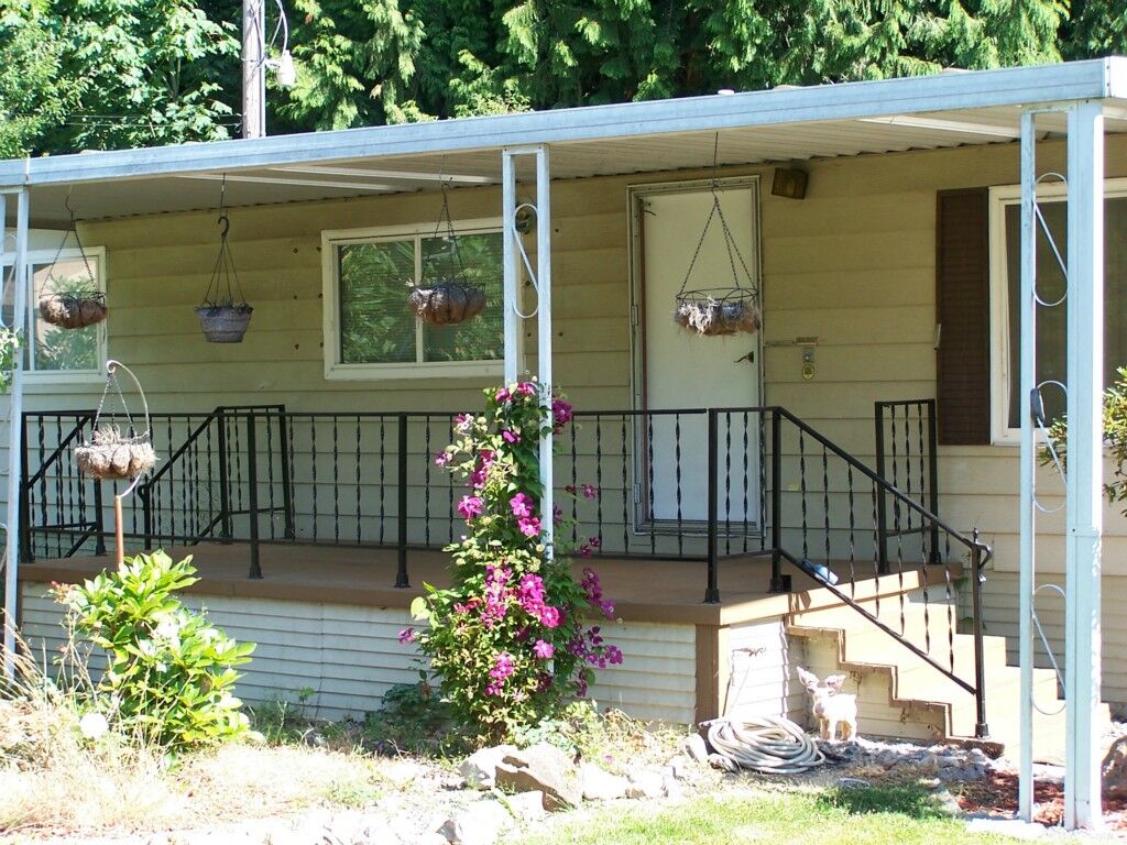 Property Photo:  411 205th St SW  WA 98036 