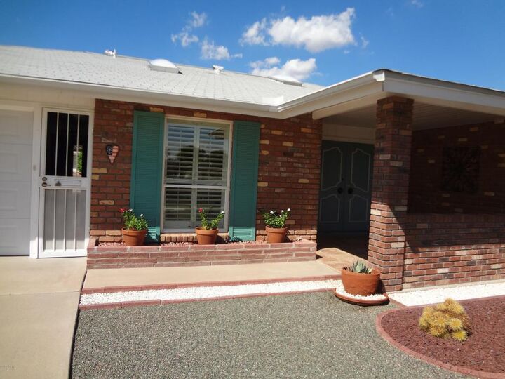 Property Photo:  9819 N 100th Lane  AZ 85351 
