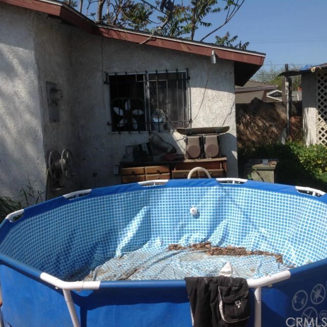 Property Photo:  7709 Maie Avenue  CA 90001 