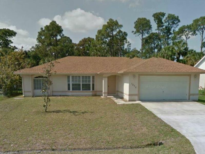 Property Photo:  1070 SW Aurelia Avenue  FL 34953 