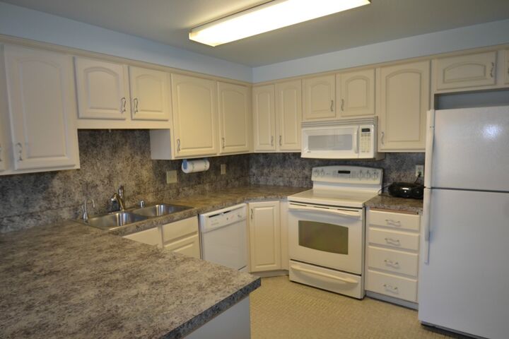 Property Photo:  9032 25th Ave SW 102J  WA 98106 