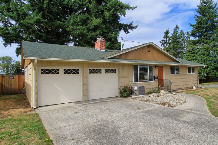 Property Photo:  7602 S Ainsworth Ave  WA 98408 