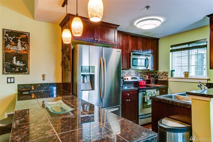 Property Photo:  1852 S 284th Lane K-201  WA 98003 