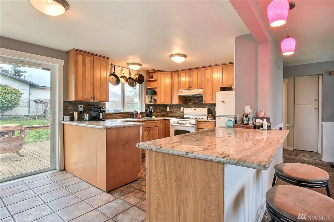 Property Photo:  7225 E E St  WA 98404 