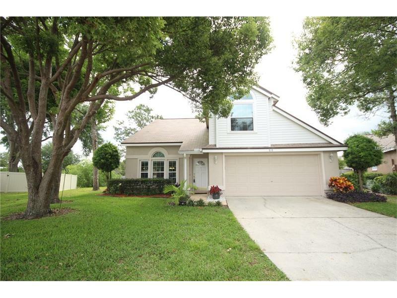 Property Photo: 818 E Charing Cross Circle FL 32746