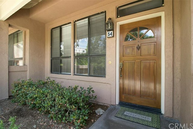 Property Photo:  155 N Singingwood Street 54  CA 92869 