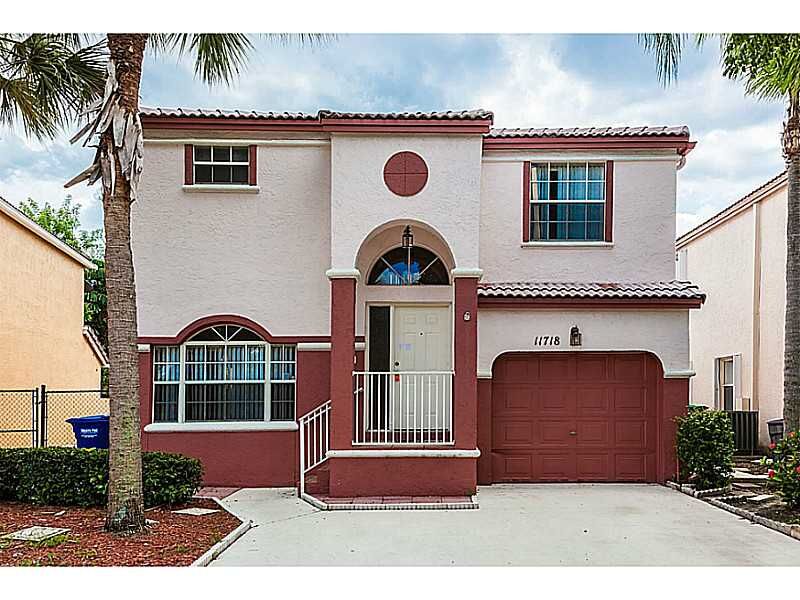 Property Photo:  11718 NW 1 Ct  FL 33071 