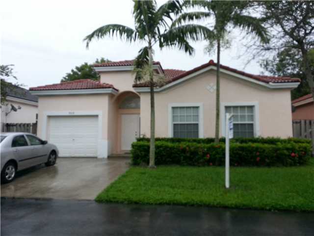 Property Photo:  9014 SW 214 Ln  FL 33189 