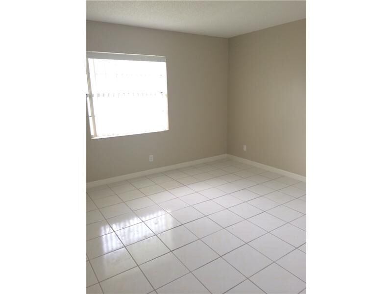 Property Photo:  3777 NW 78th Av 7D  FL 33024 