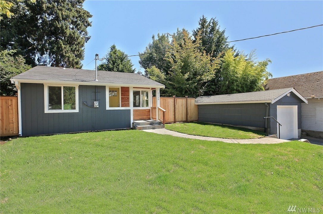 Property Photo:  8440 47th Ave S  WA 98118 