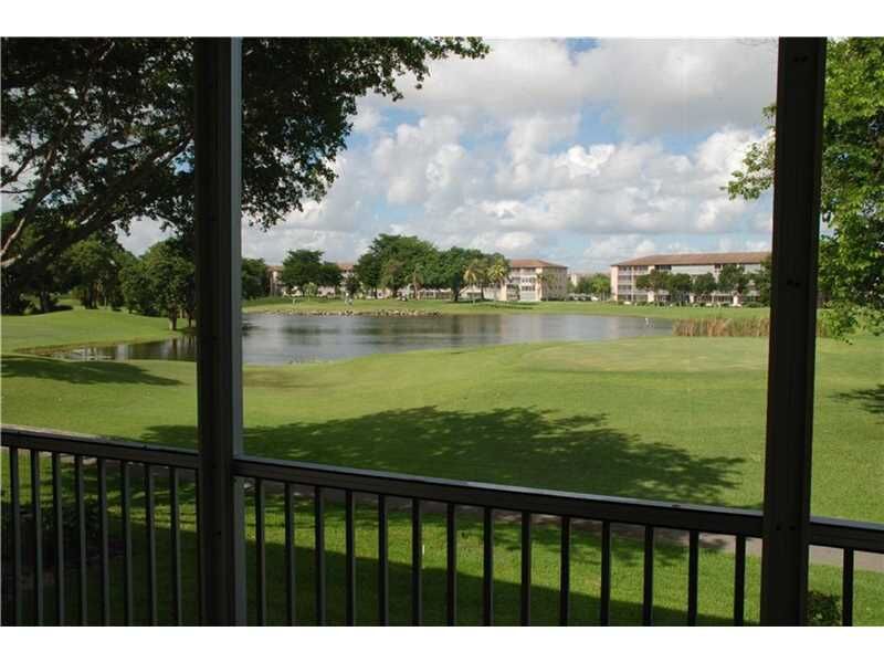 Property Photo: 300 SW 134th Way 208E FL 33027