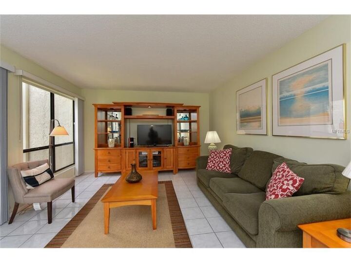 Property Photo:  6157 Midnight Pass Road F12  FL 34242 