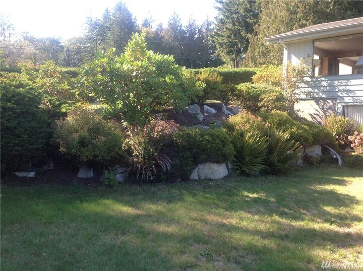 Property Photo:  20281 NW Cedar Lane  WA 98370 