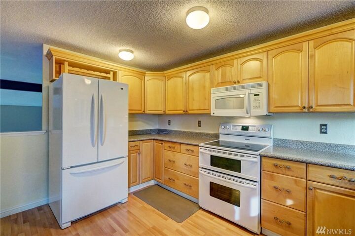 Property Photo:  19265 NE Crestwood Ct  WA 98370 