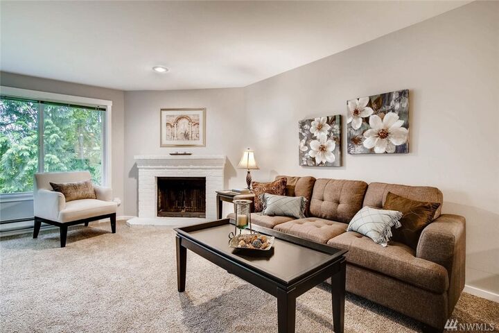 Property Photo:  11223 NE 128th St J302  WA 98034 