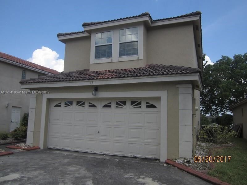 Property Photo: 731 NW 182nd Way FL 33029