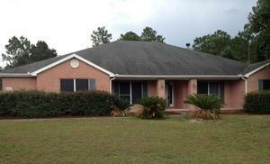 Property Photo:  5897 Saratoga Drive  FL 32536 