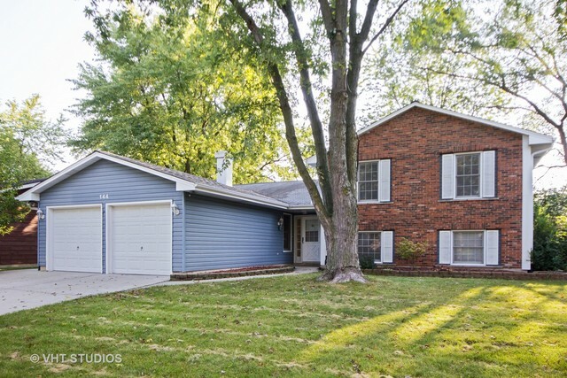 Property Photo:  144 Tamarack Drive  IL 60440 