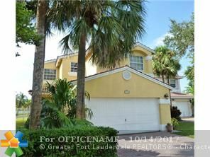 Property Photo: 9805 Fairway Cove Ln FL 33324