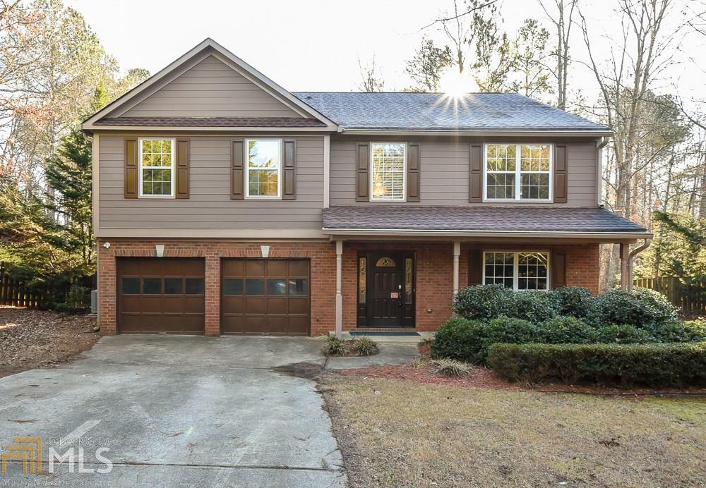 Property Photo:  5845 Woodstone Dr  GA 30028 