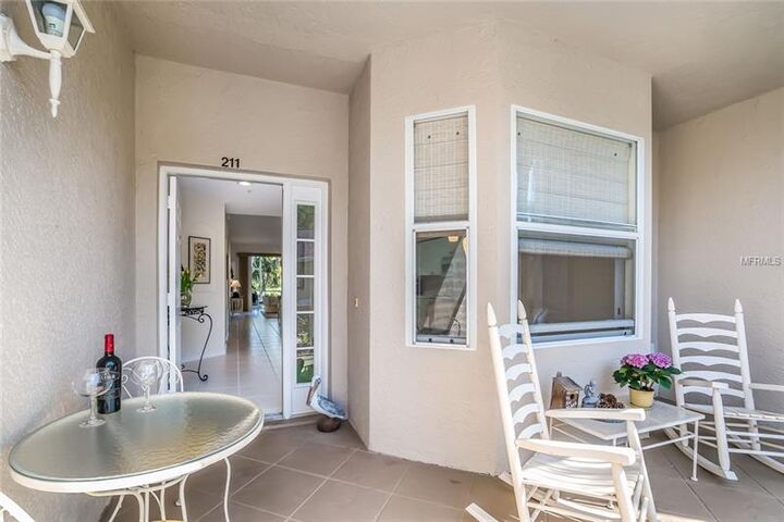 Property Photo: 5221 Mahogany Run Avenue 211 FL 34241