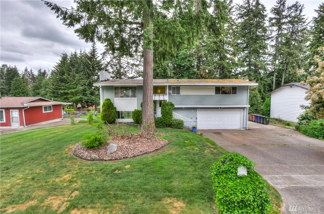 Property Photo:  6830 Roosevelt Ave  WA 98404 