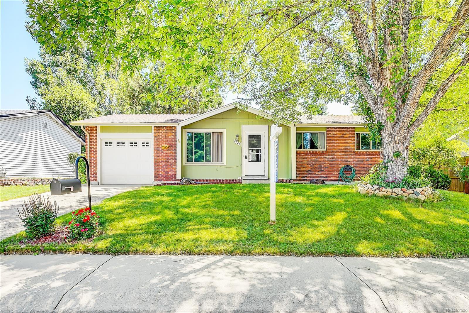 Property Photo: 8824 Dudley Court CO 80021