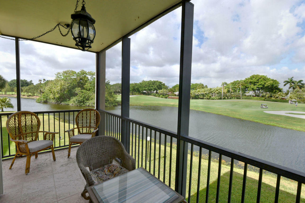 Property Photo:  11811 Avenue Of The Pga 7-2C  FL 33418 