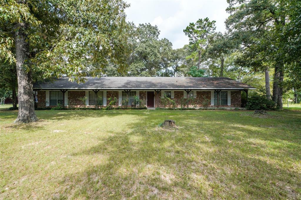 Property Photo:  206 N Duck Creek Road  TX 77328 