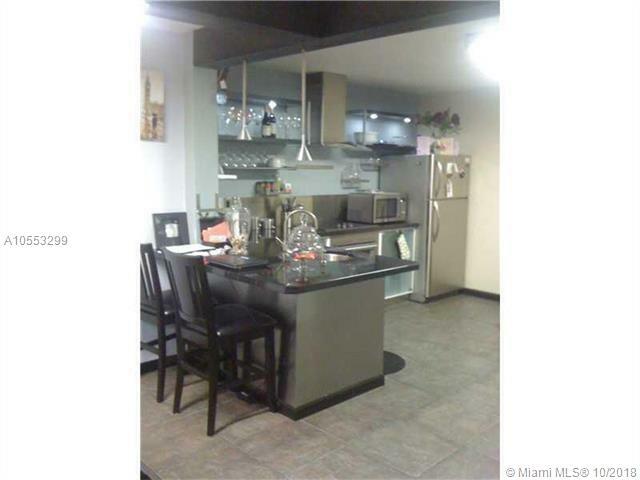 Property Photo:  10161 W Sunrise Blvd 103  FL 33322 