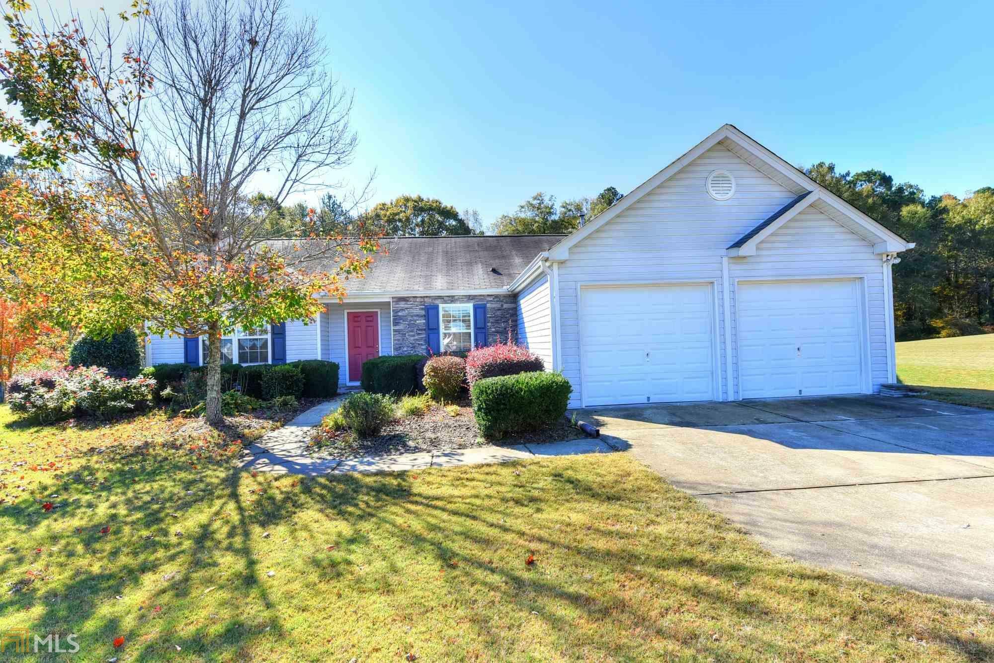 Property Photo:  8425 River Hill Commons Dr  GA 30107 