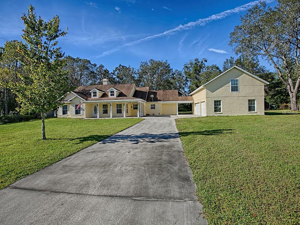 Property Photo:  25342 Rolling Oak Rd  FL 32776 