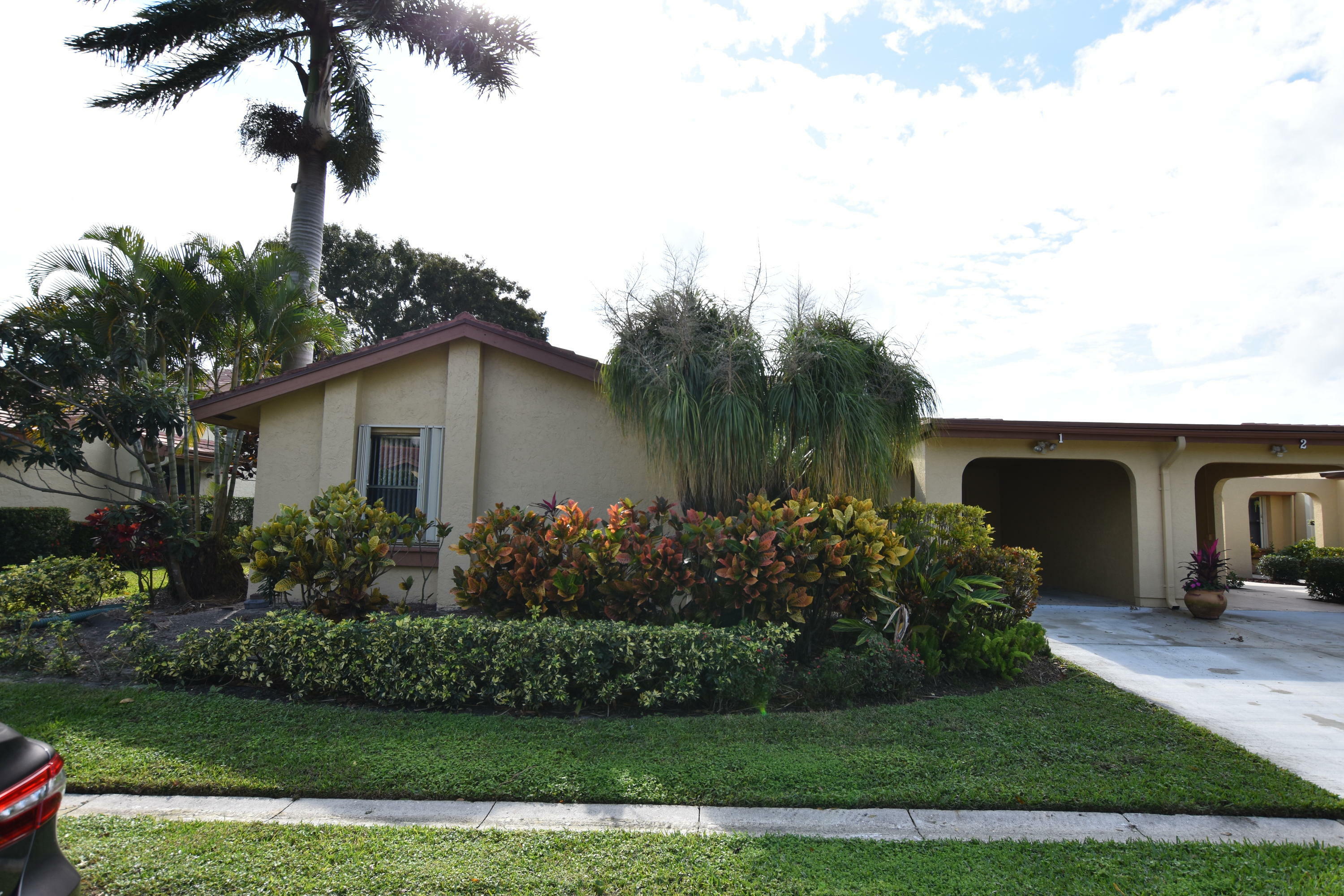 Property Photo:  5920 Forest Grove Drive 1  FL 33437 