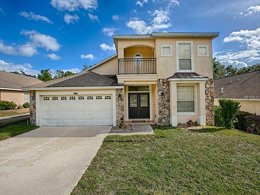 Property Photo:  33246 Irongate Drive  FL 34788 