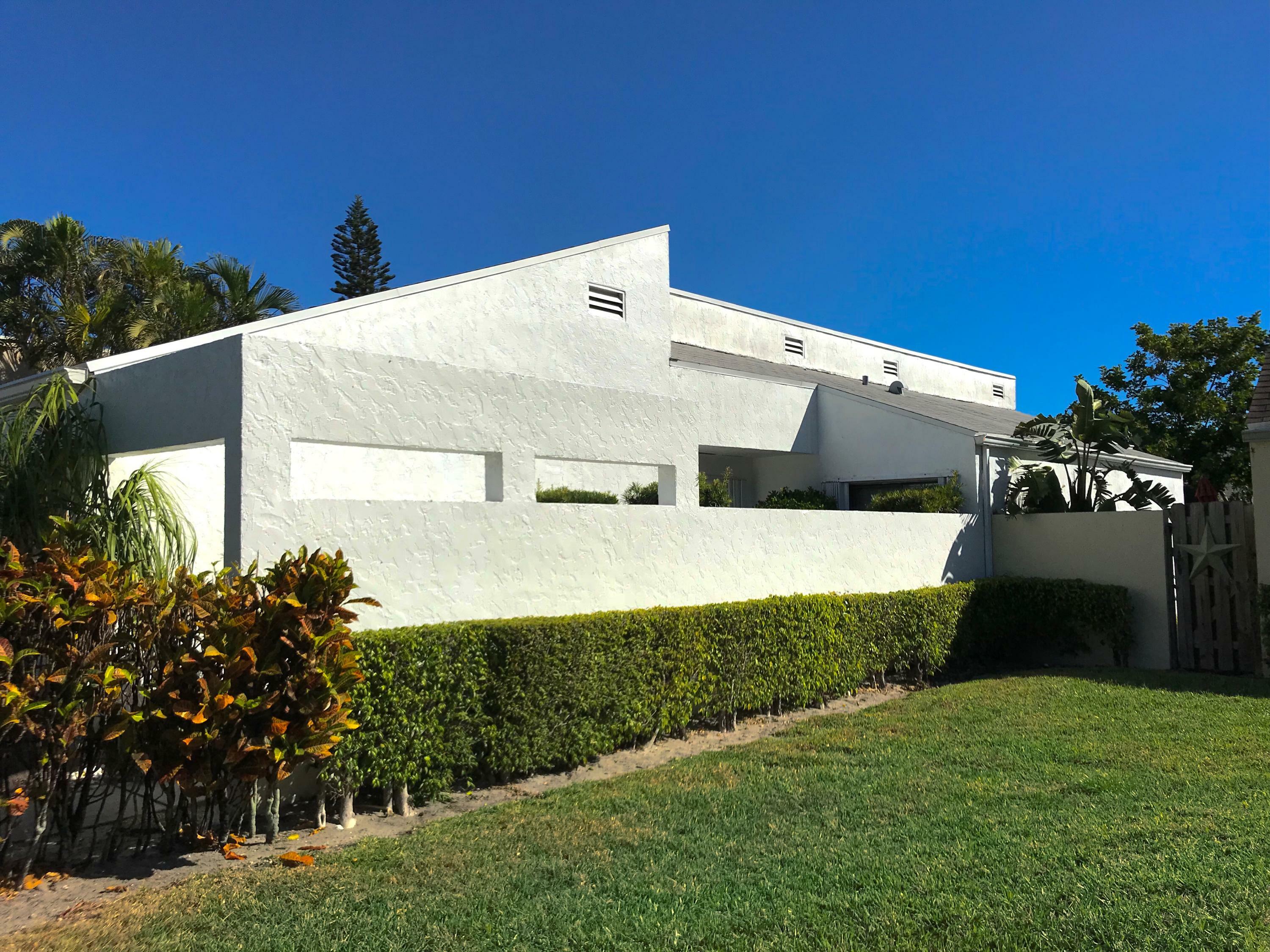 Property Photo:  905 NW 22nd Avenue  FL 33445 