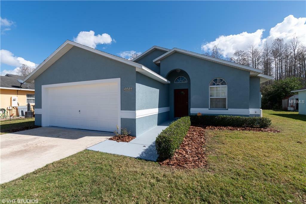 Property Photo:  2456 Oak Mill Drive  FL 34744 