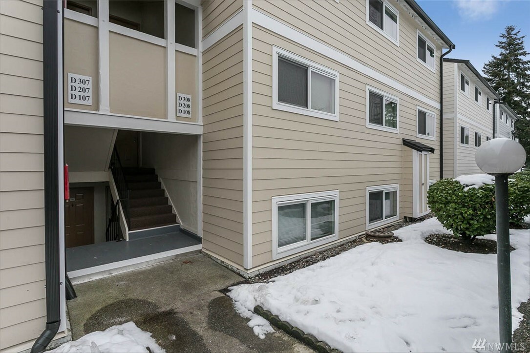 Property Photo:  15210 Macadam Rd S D-207  WA 98188 