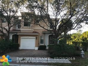 Property Photo:  102 E Astor Cir  FL 33484 