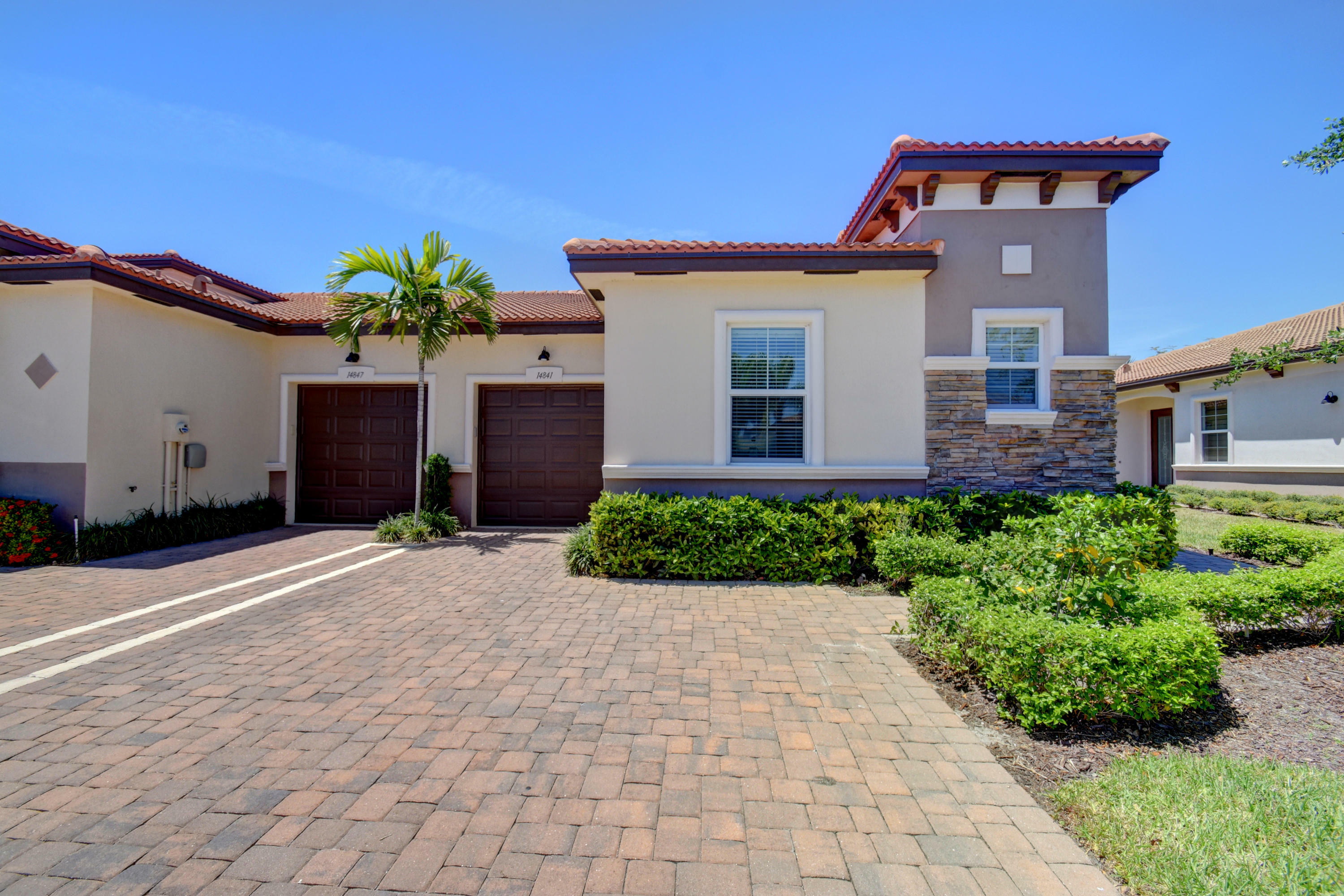 Property Photo: 14841 Amerina Way FL 33446