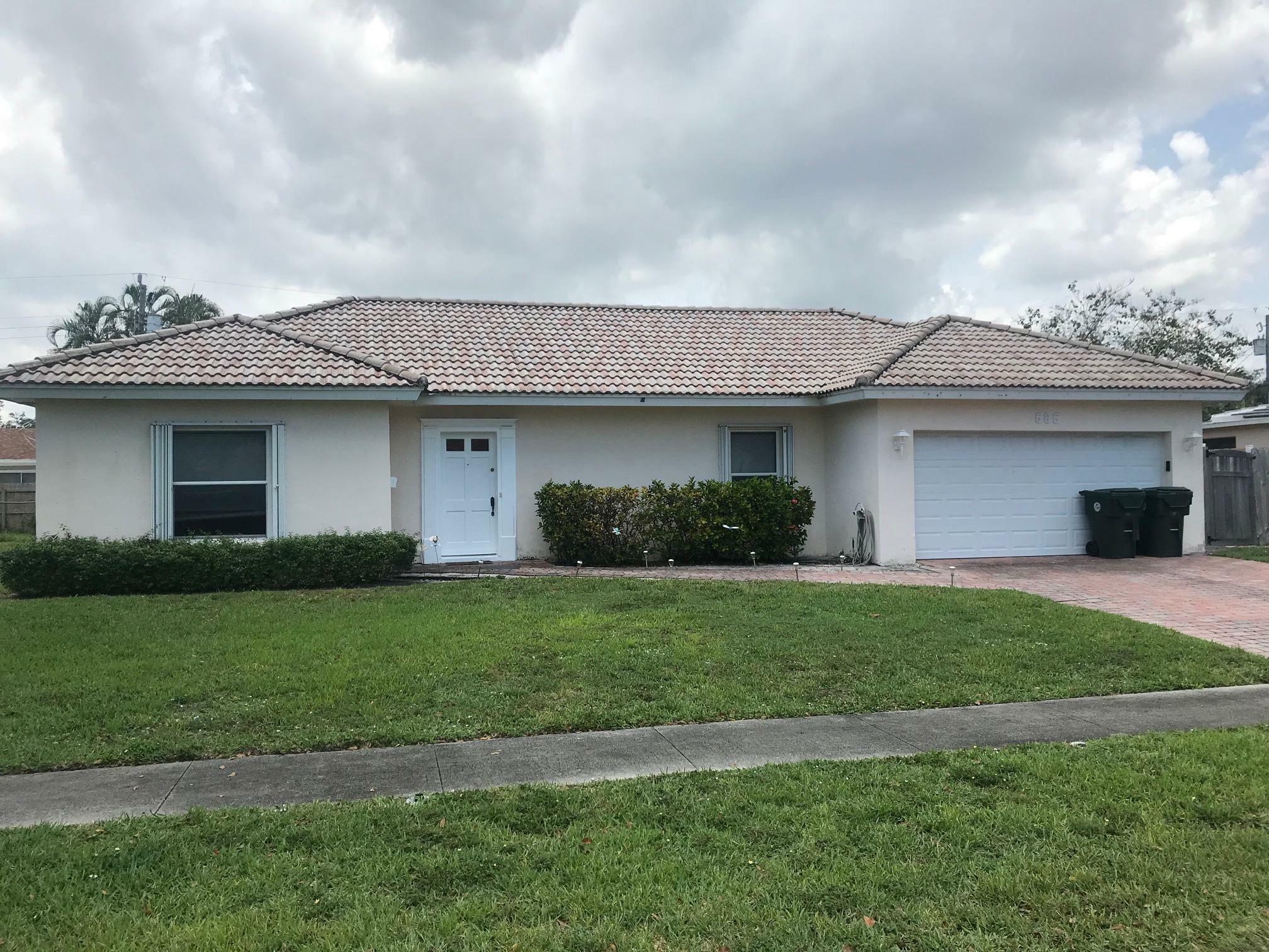 Property Photo:  585 NW 15th Avenue  FL 33486 