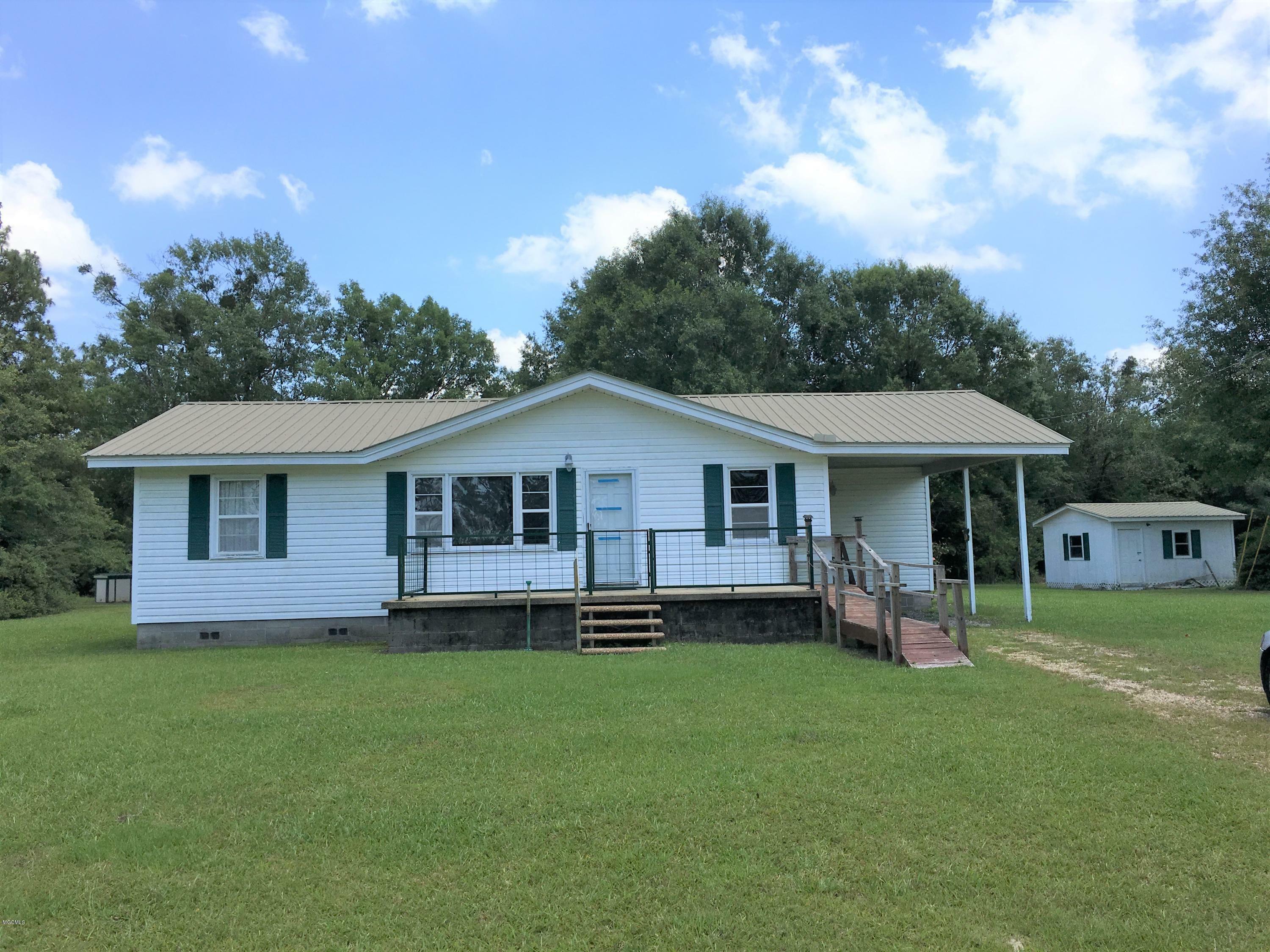 Property Photo:  15576 Three Rivers Road  MS 39532 