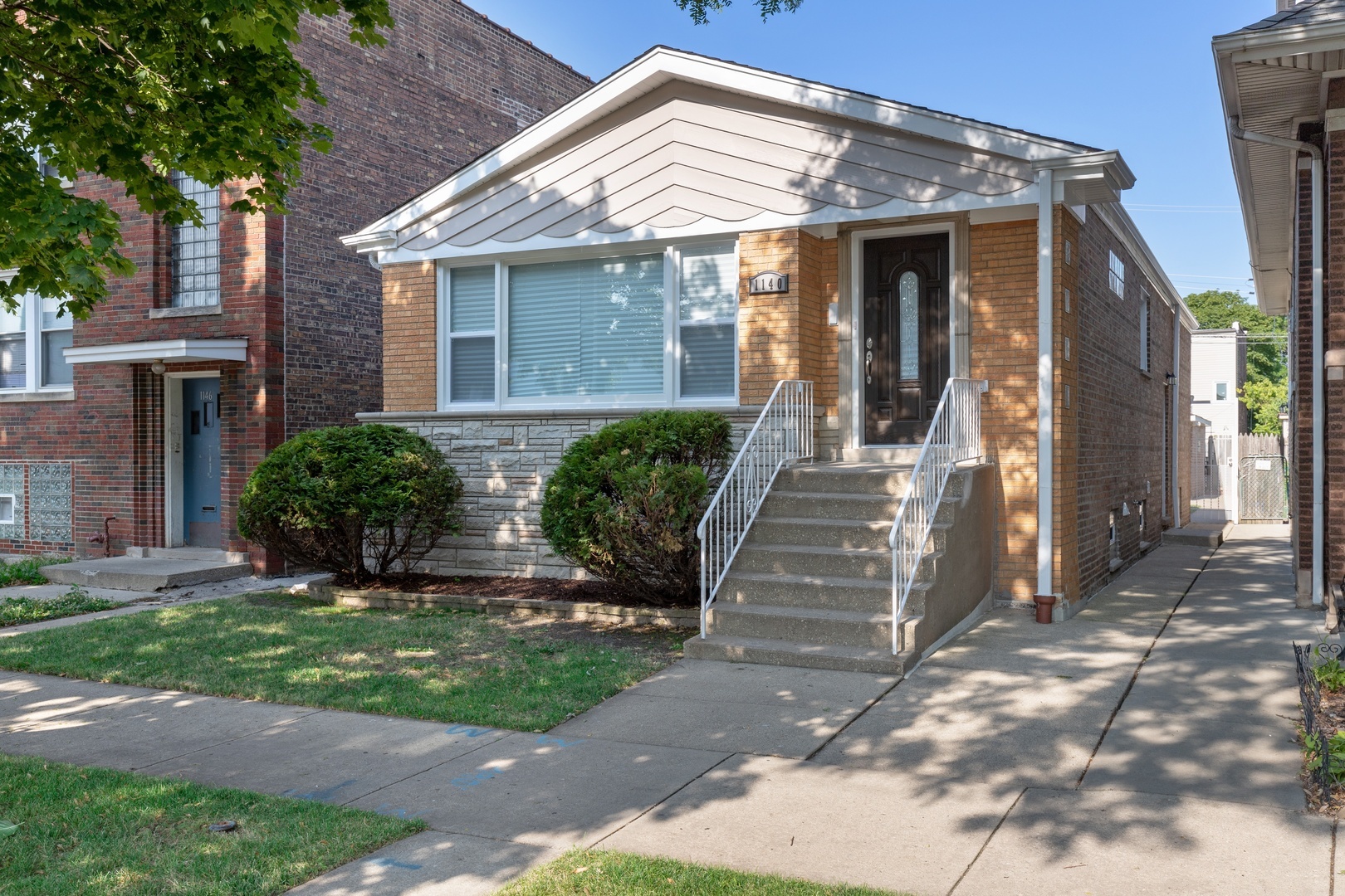 Property Photo:  1140 South Menard Avenue  IL 60644 