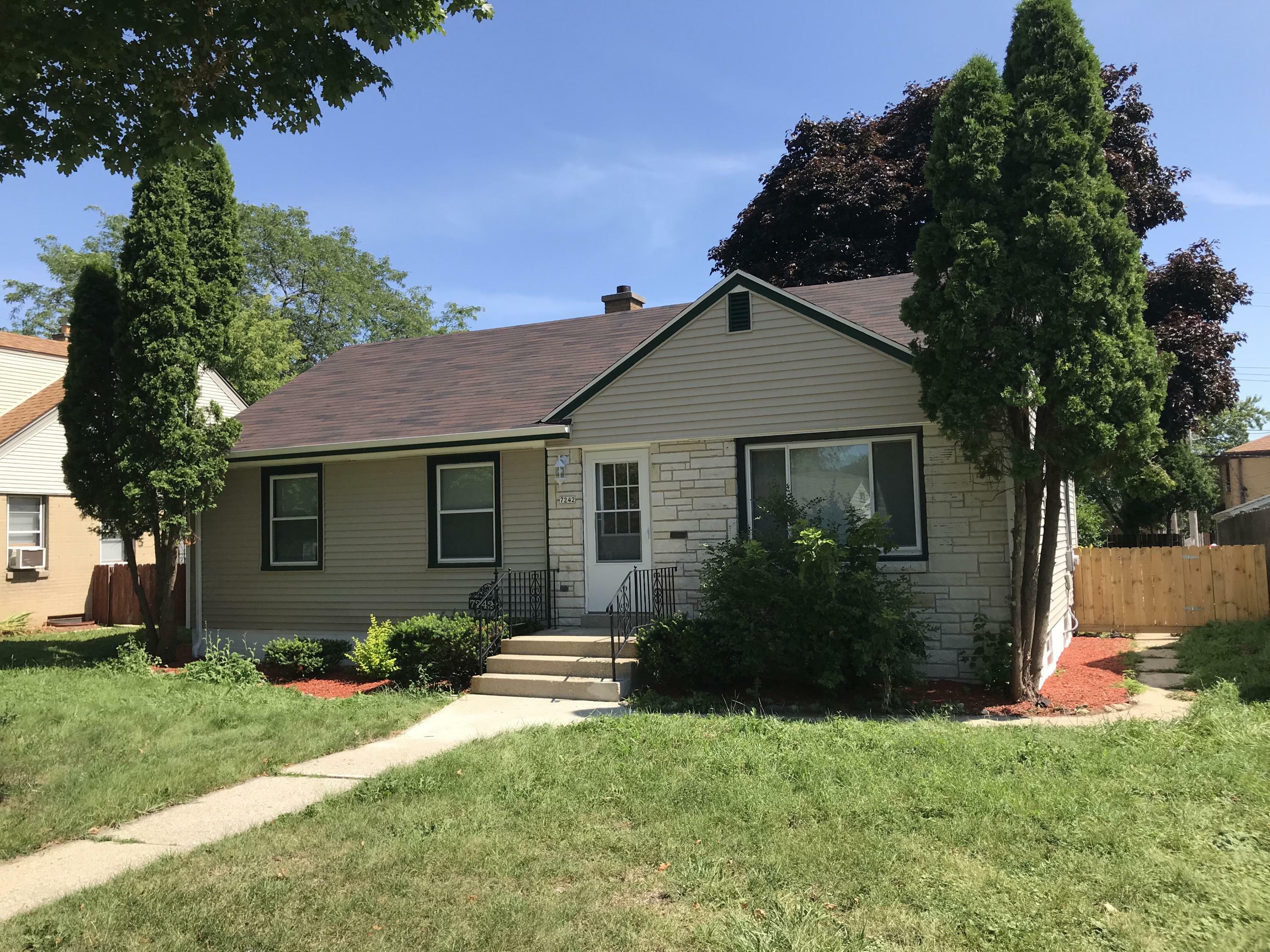 Property Photo:  7242 W Potomac Ave  WI 53216 