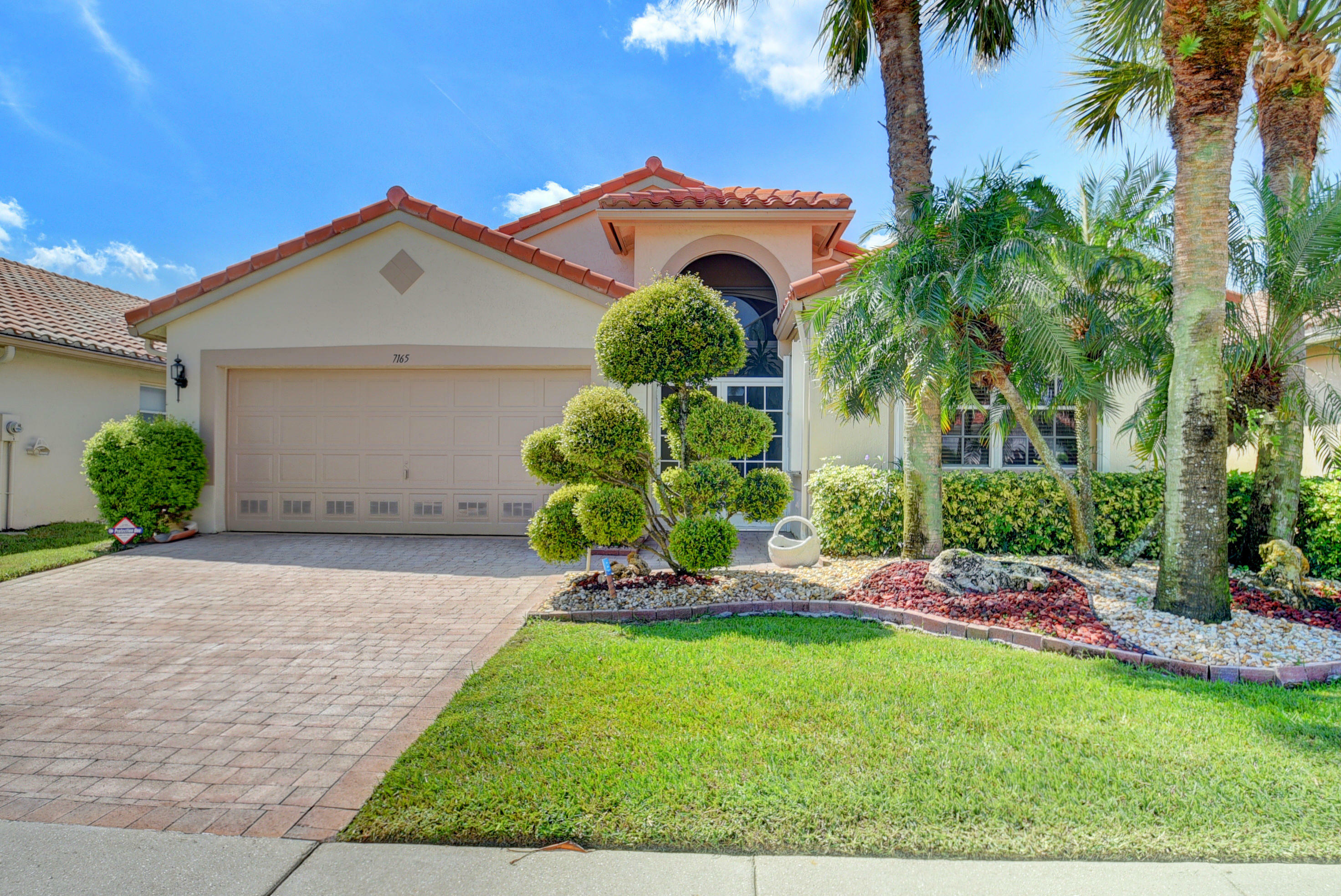 Property Photo:  7165 Haviland Circle  FL 33437 