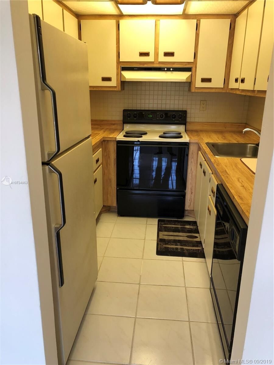 Property Photo: 1101 SW 122nd Ave 212 FL 33184