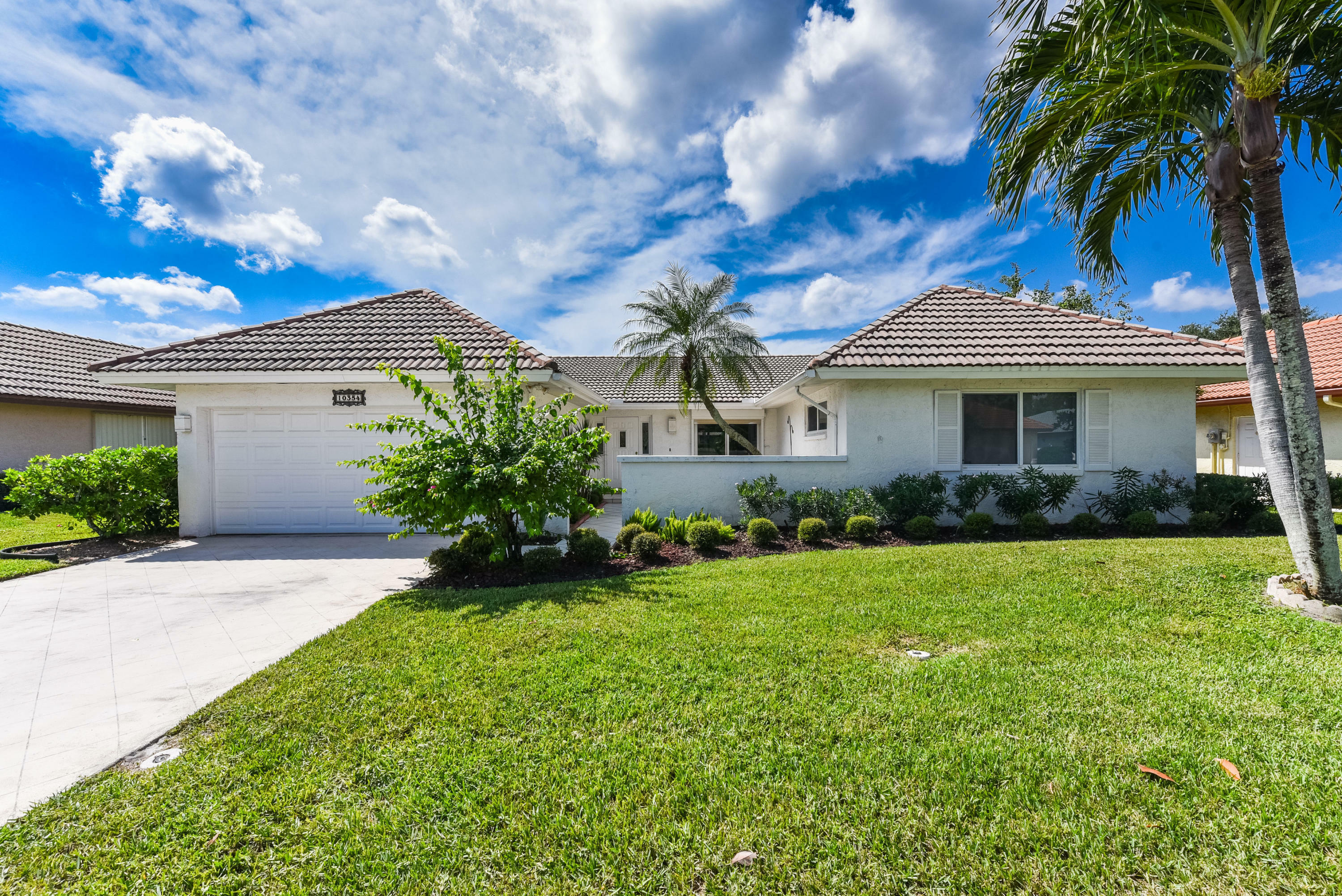 Property Photo:  10354 Greentrail Drive N  FL 33436 