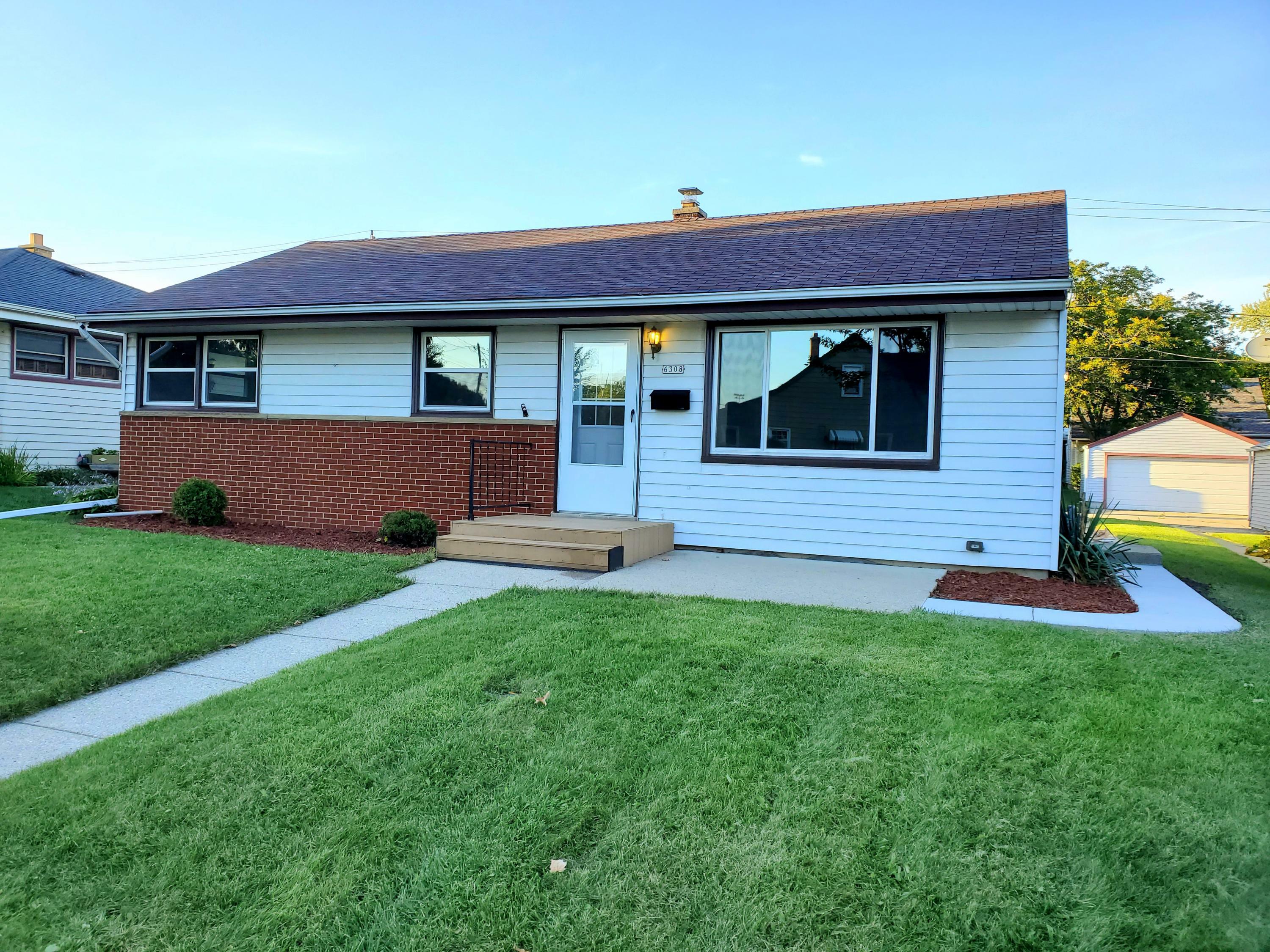 Property Photo: 6308 W Fremont Pl WI 53219